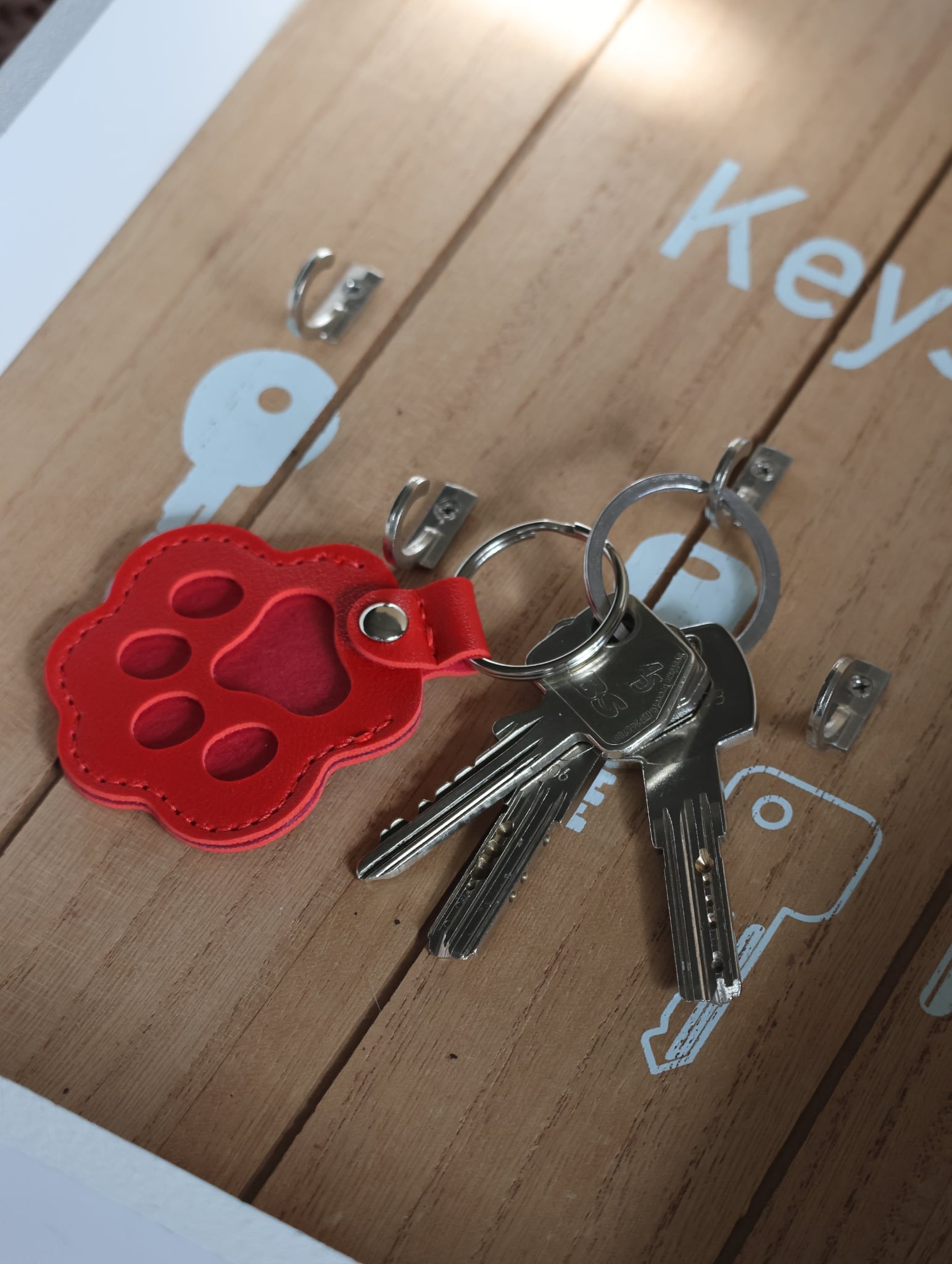 Porte clé " Pattes Rouge "