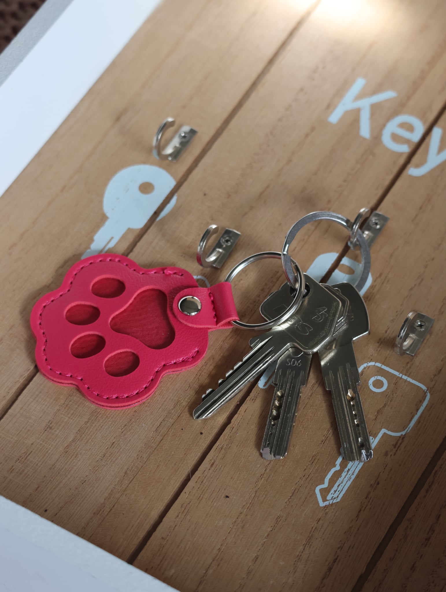 Porte clé " Pattes Fushia "