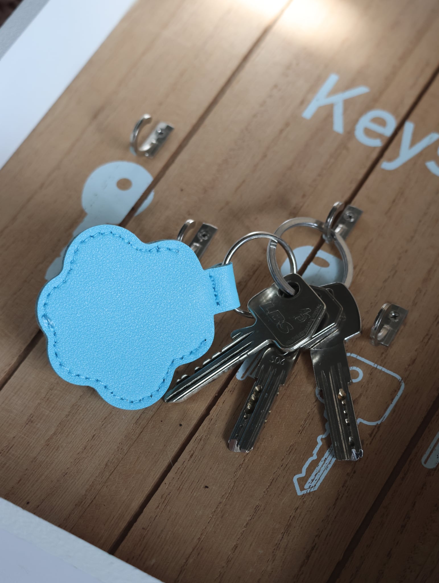 Porte clé " Pattes Bleu ciel "