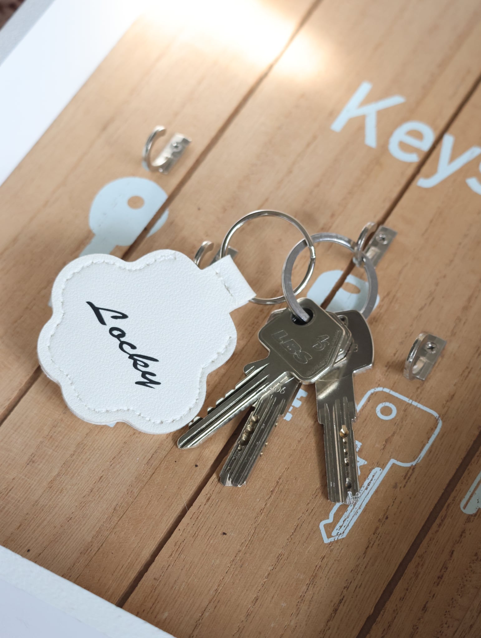 Porte clé " Pattes Blanc "