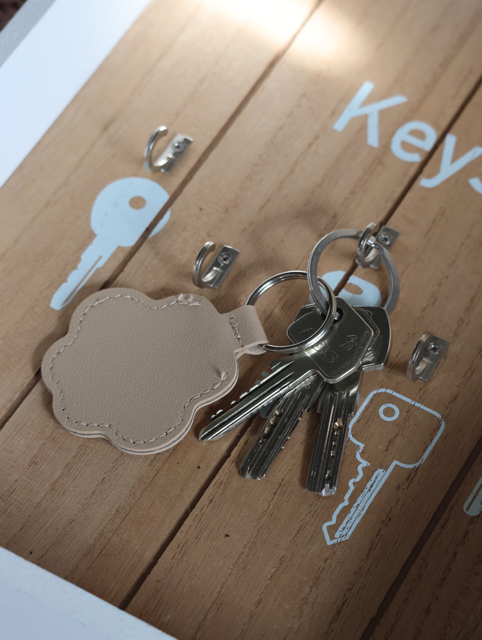 Porte clé " Pattes Beige "