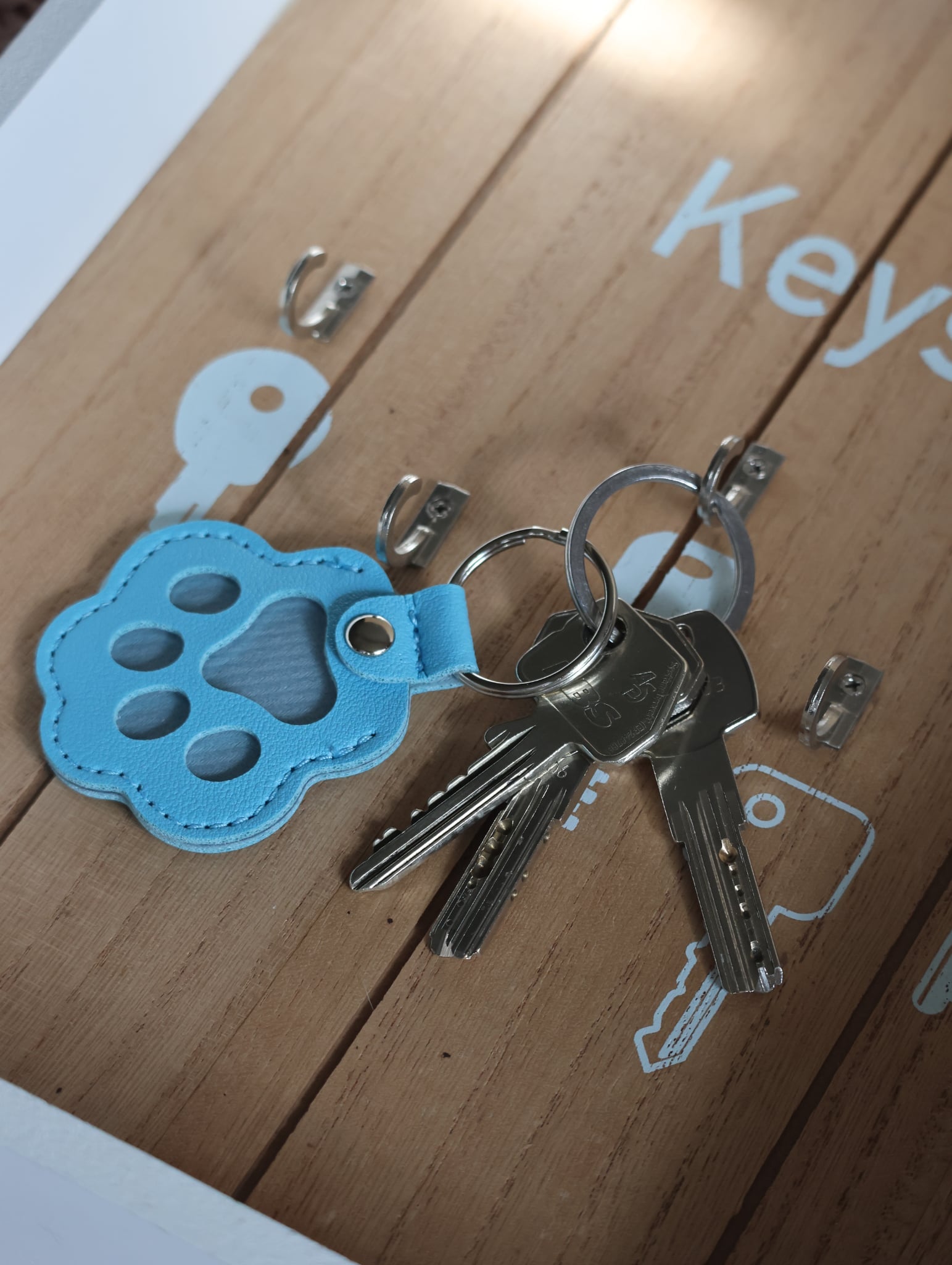 Porte clé " Pattes Bleu ciel "